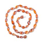 Handmade Baltic amber necklace with warm golden-orange beads and elegant, polished design.