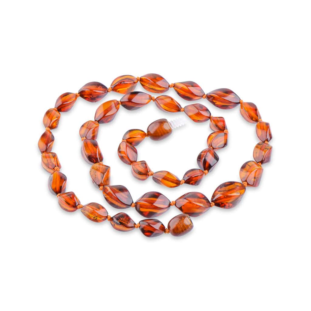 Elegant Baltic amber necklace with caramel-colored oval beads and sparkling facets.