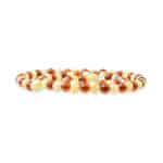 Symmetrical Baltic amber beads in warm orange and beige create a stylish, handcrafted jewelry piece.