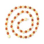 Beautiful spiral Baltic amber necklace with dual amber and yellow polished beads.