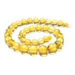 Handmade Baltic amber necklace with warm, golden-yellow, translucent beads and artisan craftsmanship.