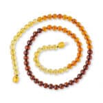 Handmade Baltic amber mala with warm gradient beads, ideal for meditation and stylish accessories.