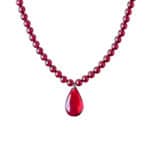 Elegant red Baltic amber necklace with teardrop pendant, handcrafted and perfect for any occasion.