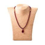 Elegant red Baltic amber necklace with teardrop pendant, perfect for sophisticated everyday or special wear.