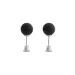 Pair of modern black spherical microphones on adjustable metal stands for studio or broadcast use.