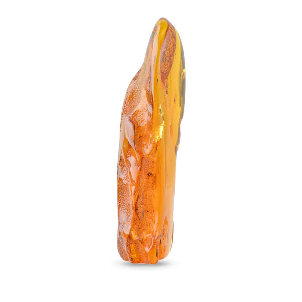 Beautiful polished amber pendant with natural inclusions and warm, vibrant orange hues.