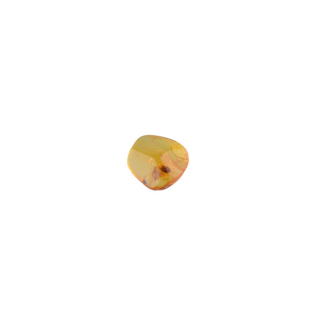 Small golden metallic pebble with smooth, reflective surface and soft, rounded edges.