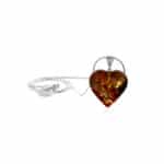 Handmade Baltic Amber Heart Necklace with Sterling Silver Chain, natural warm hues and inclusions.