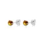 Elegant honey-yellow gemstone studs in sterling silver, perfect for daily or special occasions.