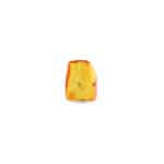 Polished amber resin with colorful inclusions and a smooth, handcrafted appearance.