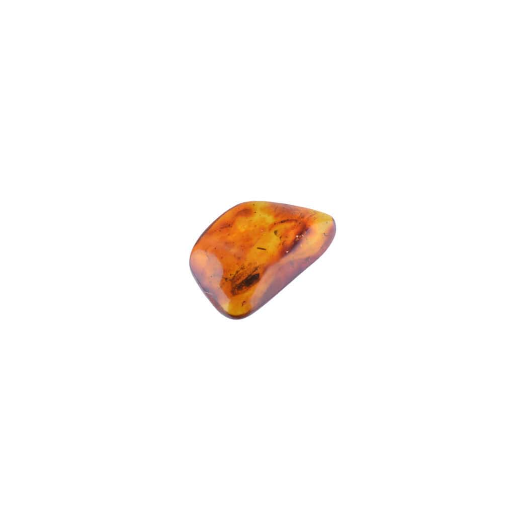 Translucent Baltic amber piece with warm tones and natural inclusions, showcasing organic beauty and timeless elegance.