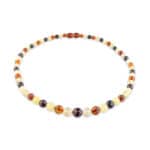 Elegant Baltic amber necklace with warm cognac tones and polished, natural beads.