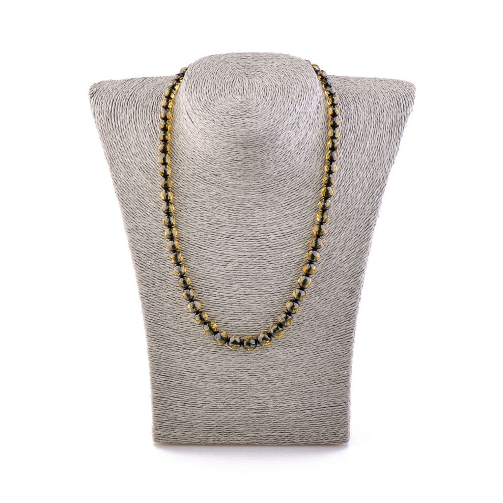Natural Baltic amber necklace with warm green tones, elegant and versatile for everyday style.