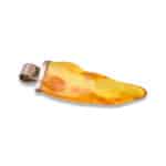 Golden Baltic amber pendant with organic leaf shape and silver bail, stylish and natural jewelry.