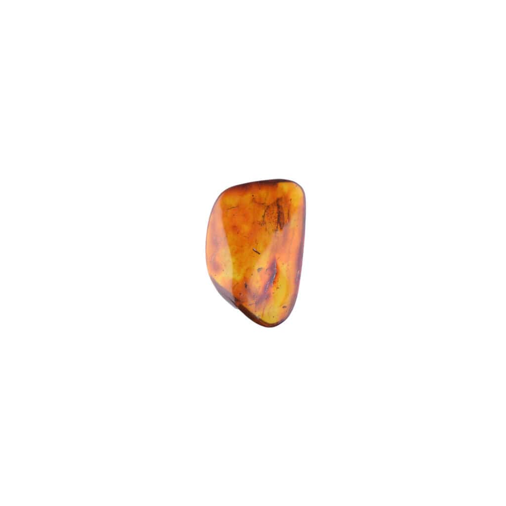Polished amber gemstone with warm golden hues and reflective, smooth surface highlighting natural beauty.