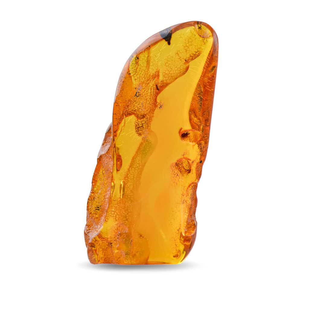 Polished Baltic amber pendant showcasing warm golden hues and natural inclusions.