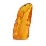 Polished Baltic amber pendant showcasing warm golden hues and natural inclusions.