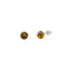 Beautiful amber stud earrings with warm, golden-orange natural gemstones on sterling silver posts.