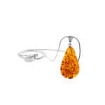 Handmade Baltic amber teardrop necklace with silver bail, elegant natural jewelry for any occasion.