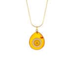 Modern yellow Baltic amber teardrop necklace with circular accent, sterling silver chain, elegant and versatile.