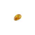 Vibrant yellow polished gemstone with subtle inclusions, perfect for elegant jewelry or collection.