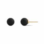 Minimalist black spherical earrings with gold-toned posts, perfect for modern, versatile jewelry styles.
