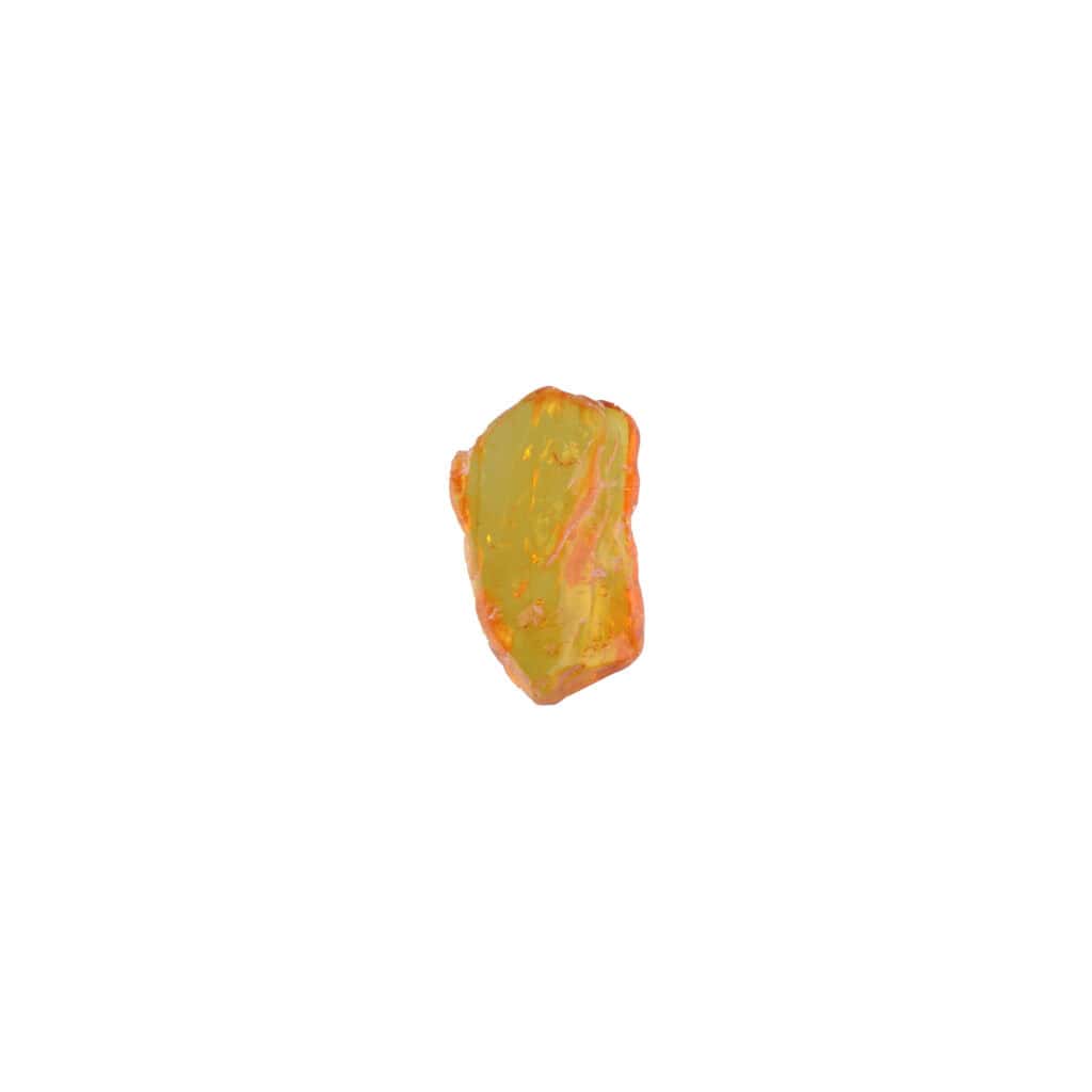 Natural yellow stone with orange accents and textured surface on plain white background.