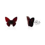 Red butterfly-shaped stud earrings with silver posts, elegant and handcrafted for versatile style.