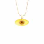 Yellow eye-shaped Baltic amber pendant on a elegant gold chain, handcrafted and unique.