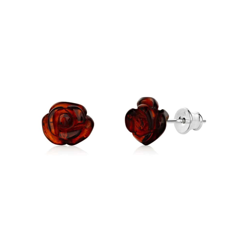 Handmade amber rose earrings with sterling silver studs, featuring warm, glossy, floral-inspired design.