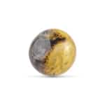 Polished round stone with golden yellow and gray gradient, vibrant patterns, and smooth, reflective surface.