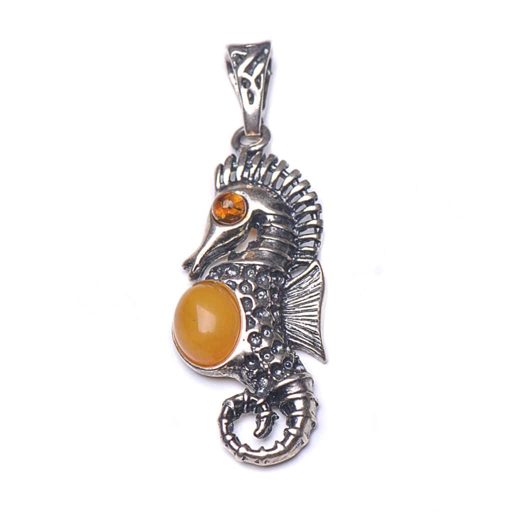 Silver seahorse pendant with orange gemstone, Baltic amber accents, handcrafted jewelry gift.