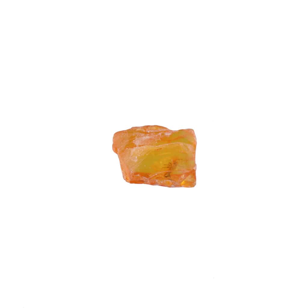 Natural orange and green gemstone with rough texture and vibrant, organic mineral appearance.