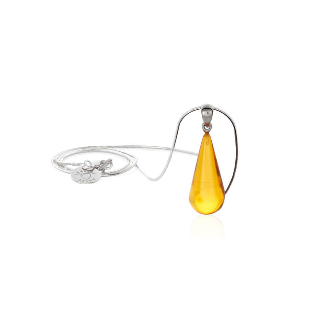 Vibrant yellow teardrop pendant on sleek silver chain, elegant jewelry for any special occasion.