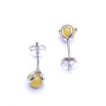 Elegant yellow gemstone stud earrings with silver settings for everyday or special occasions.